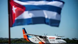 (FILES) A plane carrying a donation of powdered milk from Cubans living in the US, is seen at the Jose Marti International airport in Havana, on March 11, 2022. Cuba has warned airlines it is suspending jet fuel supplies for a month because of an energy crisis prompted by the US attack on Venezuela, an official at a European carrier said on February 8, 2026. (Photo by YAMIL LAGE/AFP)