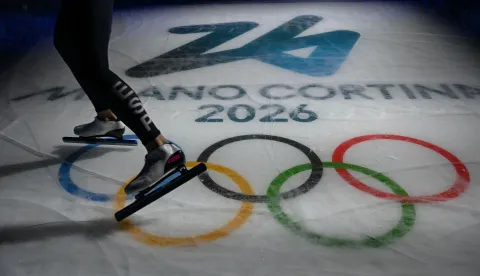 Spain's Daniel Milagros skates pasta an Olympic logo during the warmup before the speed skating men's 1000m during the Milano Cortina 2026 Winter Olympic Games at Milano Speed Skating Stadium in Milan on February 11, 2026. (Photo by PIERO CRUCIATTI/AFP)