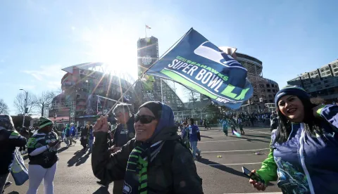 SEATTLE, WASHINGTON - FEBRUARY 11: Fans celebrate during the Seattle Seahawks Super Bowl LX victory celebration and parade at Lumen Field on February 11, 2026 in Seattle, Washington. Steph Chambers/Getty Images/AFP (Photo by Steph Chambers/GETTY IMAGES NORTH AMERICA/Getty Images via AFP)