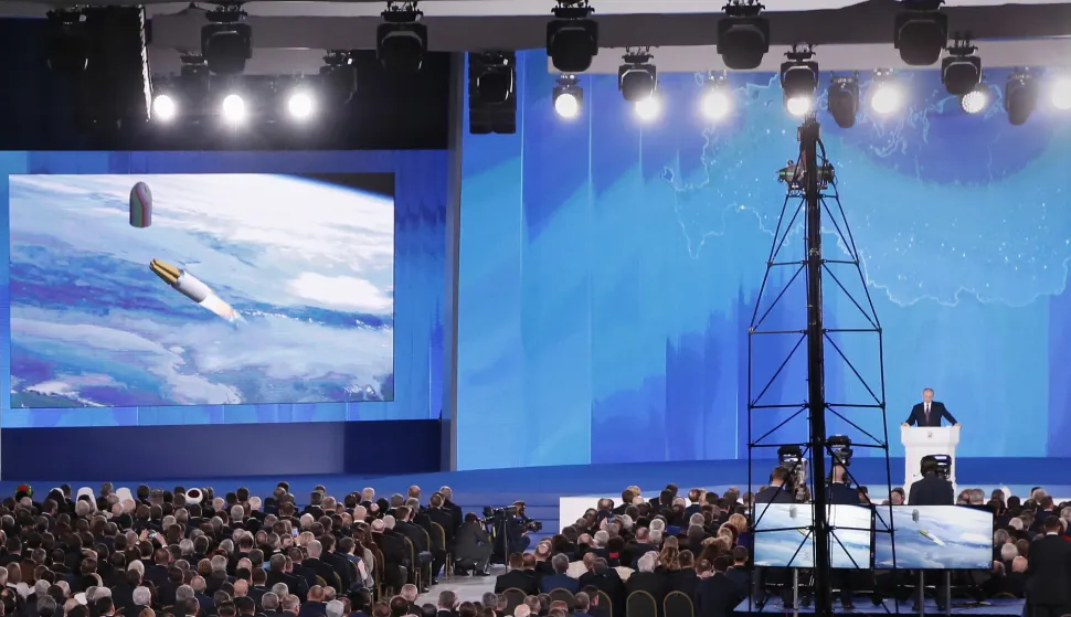 epa07771099 (FILE) - Russian President Vladimir Putin delivers his annual address to the Federal Assembly while a screen shows a newly developed cruise missile with 'no range limitation' at the Manezh Central Exhibition Hall in Moscow, Russia, 01 March 2018 (reissued 13 August 2019). According to a statement by Russia's state nuclear agency Rosatom, five Russian nuclear engineers have died in a suspected explosion of a nuclear-fueled missile on 08 August 2019. The specialists were allegedly testing the unnamed missile on an off-shore platform near Severodvinsk, Arkhangelsk region, northern Russia. EPA/MAXIM SHIPENKOV