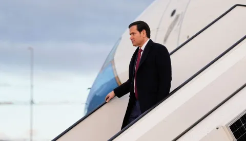 US Secretary of State Marco Rubio disembarks from his plane, on February 12, 2026, at Munich airport, before attending the Munich Security Conference. (Photo by Alex Brandon/POOL/AFP)