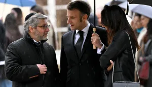 (From L) Chief Rabbi of France Haim Korsia, France's President Emmanuel Macron and Anne-Laure Abitbol, sister of Ilan Halimi, a 23-year-old French Jew who was tortured and murdered in 2006, attend a ceremony commemorating the 20th anniversary of his murder at The Elysee Presidential Palace in Paris on February 13, 2026. (Photo by Bertrand GUAY/POOL/AFP)