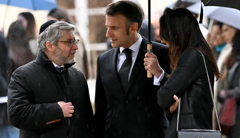 (From L) Chief Rabbi of France Haim Korsia, France's President Emmanuel Macron and Anne-Laure Abitbol, sister of Ilan Halimi, a 23-year-old French Jew who was tortured and murdered in 2006, attend a ceremony commemorating the 20th anniversary of his murder at The Elysee Presidential Palace in Paris on February 13, 2026. (Photo by Bertrand GUAY/POOL/AFP)