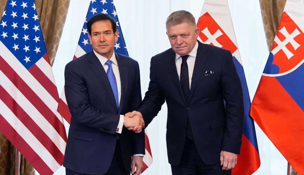 US Secretary of State Marco Rubio (L) shakes hands with Slovakia's Prime Minister Robert Fico as they meet in Bratislava, Slovakia, on February 15, 2026. (Photo by Alex Brandon/POOL/AFP)