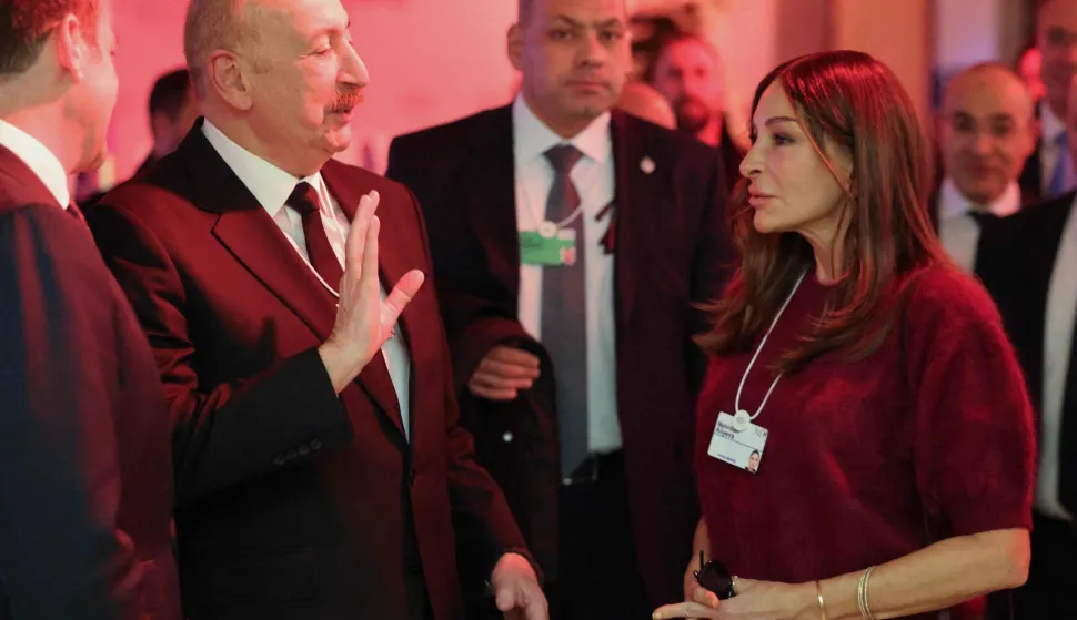 (From L) Azerbaijan's President Ilham Aliyev, and his wife Azerbaijan's Vice-President Mehriban Aliyeva attend the World Economic Forum (WEF) annual meeting in Davos on January 20, 2026. The World Economic Forum takes place in Davos from January 19 to January 23, 2026. (Photo by Ludovic MARIN/AFP)