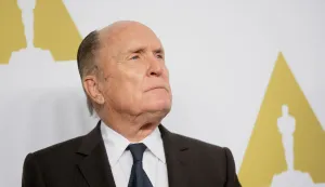 (FILES) Actor Robert Duvall arrives for the Oscars Nominees' Luncheon hosted by the Academy of Motion Picture Arts and Sciences, February 2, 2015 at the Beverly Hilton Hotel in Beverly Hills, California. Robert Duvall, who played the smooth mafia lawyer in "The Godfather" and stole the show with his depiction of a surfing-crazed colonel in "Apocalypse Now," has died at the age of 95, his wife said on February 16, 2026. (Photo by Robyn BECK/AFP)