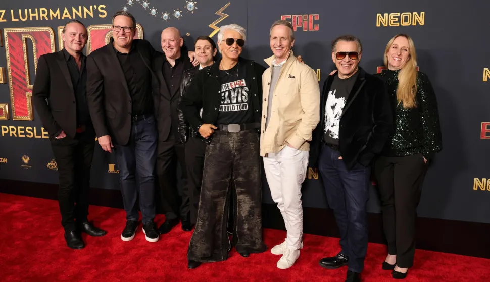 HOLLYWOOD, CALIFORNIA - FEBRUARY 18: (L-R) Jonathan Redmond, Tom Mackay, Colin Smeeton, Jeremy Castro, Baz Luhrmann, Tom Quinn, CEO, NEON, Matthew Gross and Krista Wegener attend the Los Angeles Premiere of Baz Luhrmann's "EPiC: Elvis Presley In Concert" Presented by Neon at TCL Chinese Theatre on February 18, 2026 in Hollywood, California. Kevin Winter/Getty Images/AFP (Photo by KEVIN WINTER/GETTY IMAGES NORTH AMERICA/Getty Images via AFP)