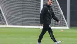 Club Brugge's Croatian coach Ivan Leko walks during a training session on the eve of the UEFA Champions League knockout round play-off first leg football match against Atletico Madrid in Knokke-Heist on February 17, 2026. (Photo by BRUNO FAHY/Belga/AFP)/Belgium OUT