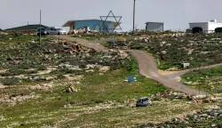 TOPSHOT - A large installation depicting a Star of David symbol is displayed at an Israeli settlement outpost on a hill by the Palestinian village of Beit Awa in the southwest of the occupied West Bank on February 11, 2026. (Photo by HAZEM BADER/AFP)
