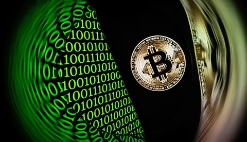 This illustration photograph taken in Mulhouse, eastern France on February 11, 2025, shows the bitcoin logo displayed on a smartphone. (Photo by SEBASTIEN BOZON/AFP)