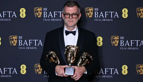 US film director Paul Thomas Anderson poses with the award for Best film for "One Battle After Another" during the BAFTA British Academy Film Awards ceremony at the Royal Festival Hall, Southbank Centre, in London, on February 22, 2026. (Photo by JUSTIN TALLIS/AFP)