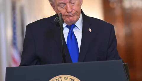 US President Donald Trump speaks during the Angel Families Remembrance Ceremony in the East Room of the White House in Washington, DC, on February 23, 2026. (Photo by SAUL LOEB/AFP)