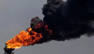 (FILES) View of a chimney at an oil refining plant of state-owned Petroleos de Venezuela (PDVSA) in Puerto La Cruz, Anzoategui state, Venezuela, on November 4, 2021. The United States on January 7, 2026, seized a Russian-flagged oil tanker in the North Atlantic after pursuing it from off the coast of Venezuela, in an operation condemned by Moscow. After the operation, Pentagon chief Pete Hegseth posted that the US blockade on Venezuelan oil was in full effect "anywhere in the world." (Photo by Yuri CORTEZ/AFP)