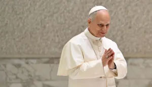 Pope Leo XIV arrives for a weekly general audience at the Paul VI hall in the Vatican on February 11, 2026. (Photo by Alberto PIZZOLI/AFP)