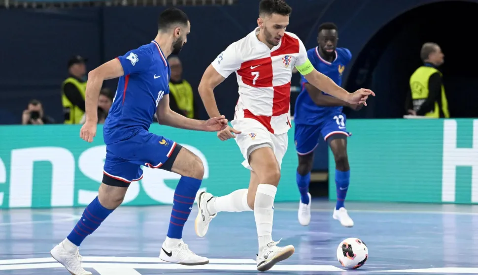 07.02.2026., Arenas Stozice, Ljubljana, Slovenija - UEFA Futsal Europsko prvenstvo 2026., utakmica za trece mjesto Francuska - Hrvatska. Abdessamad Mohammed i Franco Jelovcic Photo: Marko Lukunic/PIXSELL