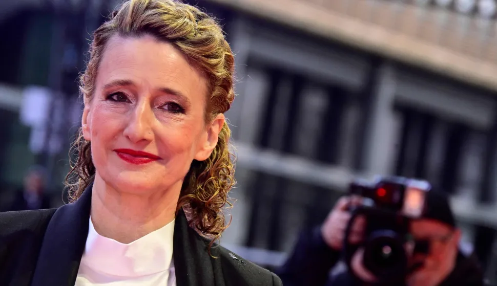(FILES) Berlinale director Tricia Tuttle arrives on the red carpet for the Award Ceremony of the 76th Berlinale, Europe's first major film festival of the year, in Berlin on February 21, 2026. German government officials will on February 26, 2026 summon organisers of the Berlin film festival, which was rocked this year by controversy over the Israel-Palestinian conflict and Gaza war. Bild daily reported that Tricia Tuttle, the US director of the Berlinale, is expected to be sacked at the meeting, citing sources close to the KBB state-owned company that runs the festival. (Photo by John MACDOUGALL/AFP)