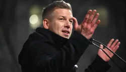 Hungarian opposition leader, head of the TISZA party and candidate for Hungarian Prime Minister Peter Magyar adresses supporters on February 16, 20226 at a campaign rally in Mezokovesd, the first stop on his resumed nationwide tour ahead of the April 12 election. Two months ahead of the general election, where polls show the opposition has a chance to put an end to Prime Minister Viktor Orban's 16-year-rule. (Photo by Attila KISBENEDEK/AFP)