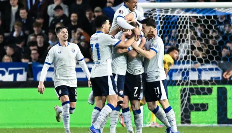 Dinamo's players celebrate after Dinamo Zagreb's Croatian forward #7 Luka Stojkovic (2R) scored his team's third goal during the UEFA Europa League knockout round play-off second leg football match between KRC Genk and GNK Dinamo Zagreb at the Cegeka Arena stadium in Genk on February 26, 2026. (Photo by JILL DELSAUX/Belga/AFP)/Belgium OUT