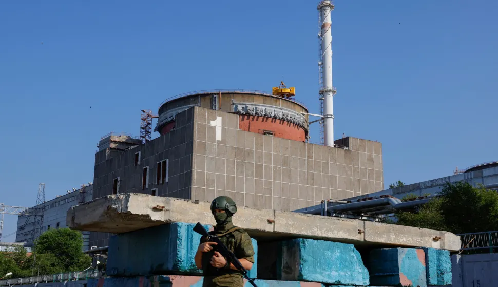 FILE PHOTO: A Russian service member stands guard at a checkpoint near the Zaporizhzhia Nuclear Power Plant before the arrival of the International Atomic Energy Agency (IAEA) expert mission in the course of Russia-Ukraine conflict outside Enerhodar in the Zaporizhzhia region, Russian-controlled Ukraine, June 15, 2023. REUTERS/Alexander Ermochenko/File Photo Photo: Alexander Ermochenko/REUTERS