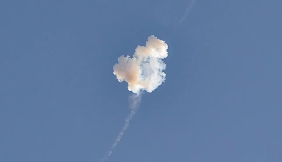 Smoke from a reported rocket interception is seen over the sky in Abu Dhabi on February 28, 2026. The United States and Israel launched strikes against Iran on February 28, with Israel's public broadcaster reporting that the Iranian supreme leader had been targeted, as the Islamic republic retaliated with barrages of missiles at Gulf states and Israel. (Photo by Fadel SENNA/AFP)