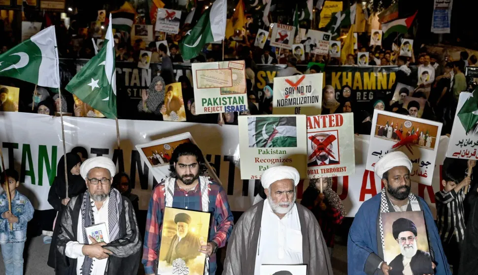Pakistani Shiite Muslims shout slogans to condemn the US-Israel attack on Iran during a protest in Karachi on February 28, 2026. The United States and Israel launched a wave of strikes against targets in Iran on February 28, sparking swift retaliation by the Islamic republic which responded with missile attacks across the region. (Photo by Rizwan TABASSUM/AFP)