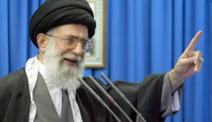 (FILES) Iran's supreme leader Ayatollah Ali Khamenei gives a Friday prayer sermon at Tehran University 11 April 2003. Witnesses said on February 28, 2026, that loud cheers echoed across parts of Tehran and residents took to their windows to applaud and play celebratory music after reports of Iranian supreme leader Ayatollah Ali Khamenei's death. (Photo by Atta KENARE/AFP)