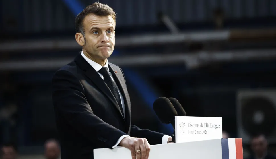 France's President Emmanuel Macron delivers a speech next to nuclear-powered ballistic missile submarine (SSBN) submarine "Le Temeraire" - S617 during his visit to the Nuclear Submarine Navy Base of Ile Longue in Crozon, north-western France on March 2, 2026. High expectations, few certainties: on March 2, 2026, Emmanuel Macron is set to outline how France's nuclear deterrent can help strengthen security in Europe in the face of a increasingly brutal world and an increasingly uncertain US ally. This issue has been brought sharply into focus by the Israeli-US offensive in Iran this weekend, against the backdrop of the Iranian nuclear crisis, which is shaking the entire Middle East and, by extension, the international community. (Photo by Yoan VALAT/POOL/AFP)