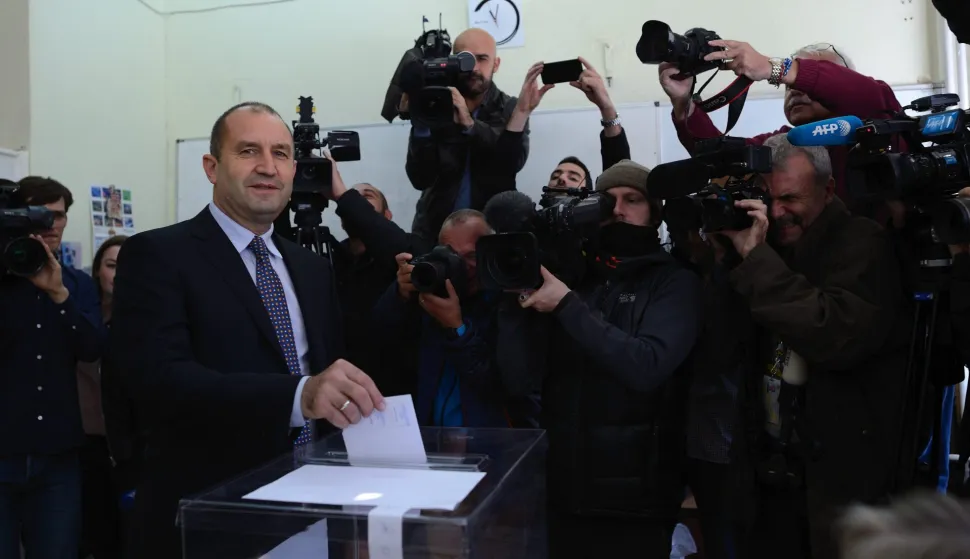 epa05629387 Rumen Radev, Presidential candidate of Initiative Committee, formally supported by the Bulgarian Socialist Party (BSP) casts his vote in the second round of Presidential elections in Bulgaria, at a polling station in Sofia, Bulgaria, 11 November 2016. Some 6.8 million Bulgarians vote in a runoff for a new president of EU member state on the Balkans. The vote will also decide the future of the center-right government in Sofia. Prime Minister Boyko Borisov said his cabinet would resign if the candidate of his GERB party, Tsetska Tsatcheva, lost the runoff. In the first round of voting on November 06, the candidate of the oppositional Socialist Party, the former general Roumen Radev, came in first. EPA/VASSIL DONEV