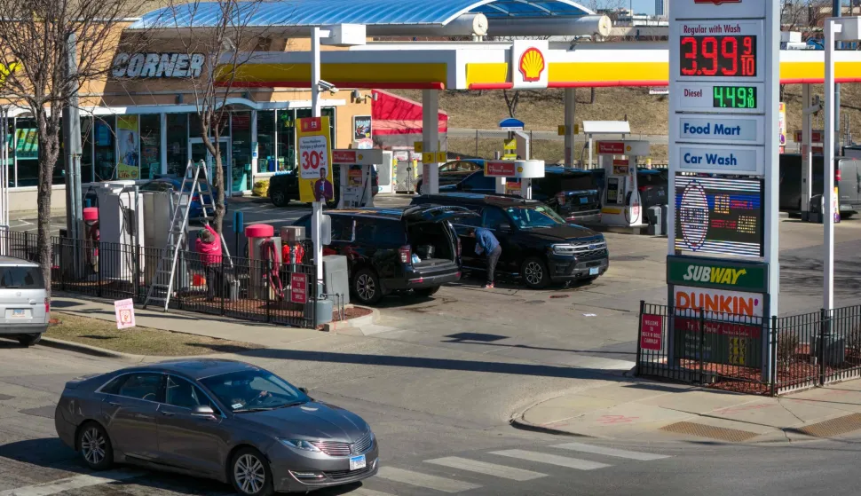 CHICAGO, ILLINOIS - MARCH 02: An aerial view shows a sign displaying prices for gasoline at a station on March 02, 2026 in Chicago, Illinois. Crude oil price spiked today on fears that a prolonged war with Iran could disrupt crude oil supplies globally, which will lead to higher gas prices for consumers. Scott Olson/Getty Images/AFP (Photo by SCOTT OLSON/GETTY IMAGES NORTH AMERICA/Getty Images via AFP)