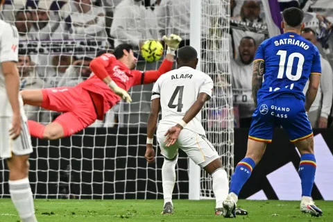 Getafe's Uruguayan forward #10 Mart?n Satriano scores the opening goal during the Spanish league football match between Real Madrid CF and Getafe CF at Santiago Bernabeu Stadium in Madrid on March 2, 2026. (Photo by Javier SORIANO/AFP)