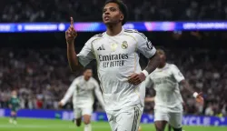 (FILES) Real Madrid's Brazilian forward #11 Rodrygo celebrates scoring his team's first goal during the UEFA Champions League league phase day 6 football match between Real Madrid CF and Manchester City at Santiago Bernabeu Stadium in Madrid on December 10, 2025. Real Madrid said on March 3, 2026 Rodrygo has suffered a severe knee injury, and it is expected to keep him out of the 2026 World Cup with Brazil. (Photo by Pierre-Philippe MARCOU/AFP)