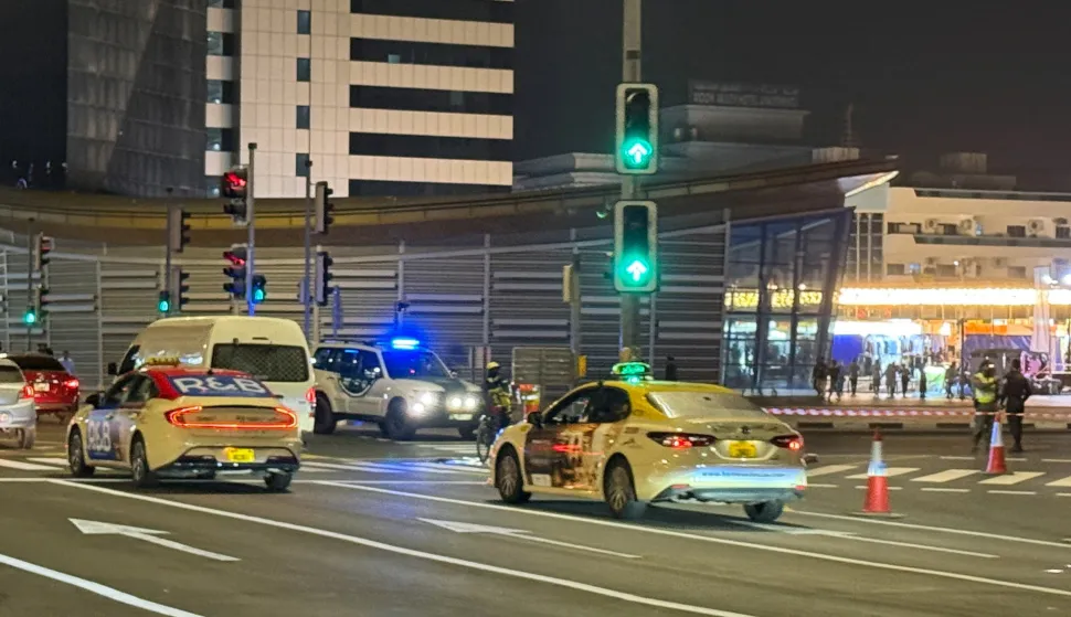A police car is parked in an intersection blocking a road near the U.S embassy, amid the U.S.-Israeli conflict with Iran, in Dubai, United Arab Emirates, March 4, 2026. REUTERS/Raghed Waked Photo: Raghed Waked/REUTERS