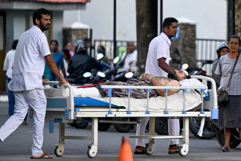 An injured Iranian sailor receives treatment at the Karapitiya hospital in Galle on March 4, 2026 after his frigate, IRIS Dena sank off Sri Lanka's coast. Sri Lanka rescued 32 "critically wounded" sailors aboard the Iranian warship which sank on March 4 following what crew members reported as an explosion, just outside the island's territorial waters, Foreign Minister Vijitha Herath said. (Photo by Ishara S. KODIKARA/AFP)