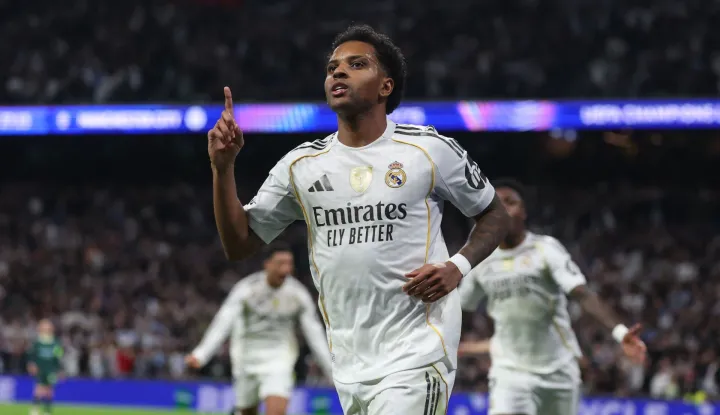 (FILES) Real Madrid's Brazilian forward #11 Rodrygo celebrates scoring his team's first goal during the UEFA Champions League league phase day 6 football match between Real Madrid CF and Manchester City at Santiago Bernabeu Stadium in Madrid on December 10, 2025. Real Madrid said on March 3, 2026 Rodrygo has suffered a severe knee injury, and it is expected to keep him out of the 2026 World Cup with Brazil. (Photo by Pierre-Philippe MARCOU/AFP)