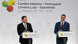 Spain's Prime Minister Pedro Sanchez (R) laughs during a joint press conference with Portugal's Prime Minister Luis Montenegro during a Spain-Portugal summit held at the La Rabida Monastery in Palos de la Frontera on March 6, 2026. (Photo by CRISTINA QUICLER/AFP)