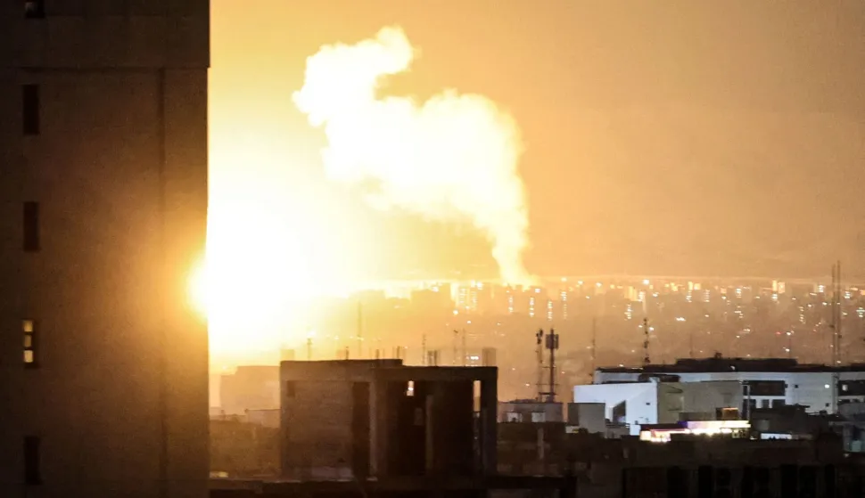 TOPSHOT - Smoke and fire rise from the site of airstrikes in a central area of the Iranian capital Tehran on March 6, 2026. Fresh strikes rocked Iran and Lebanon on March 6, as Israel vowed to escalate to a new phase in the Middle East war that has spiralled rapidly throughout the region and beyond. (Photo by ATTA KENARE/AFP)