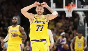 PHOENIX, ARIZONA - FEBRUARY 26: Luka Doncic #77 of the Los Angeles Lakers reacts during the second half of the NBA game against the Phoenix Suns at Mortgage Matchup Center on February 26, 2026 in Phoenix, Arizona. The Suns defeated the Lakers 113-110. NOTE TO USER: User expressly acknowledges and agrees that, by downloading and or using this photograph, user is consenting to the terms and conditions of the Getty Images License Agreement. Christian Petersen/Getty Images/AFP (Photo by Christian Petersen/GETTY IMAGES NORTH AMERICA/Getty Images via AFP)