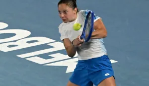 Croatia?s Antonia Ruzic hits a shot against Japan's Naomi Osaka during their women's singles match on day three of the Australian Open tennis tournament in Melbourne on January 20, 2026. (Photo by Paul Crock/AFP)/-- IMAGE RESTRICTED TO EDITORIAL USE - STRICTLY NO COMMERCIAL USE --