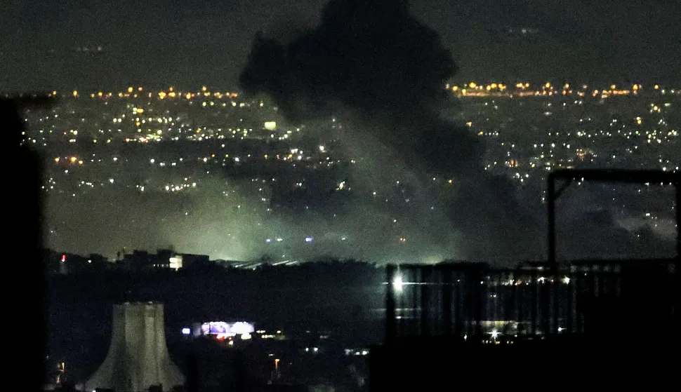 Smoke plumes billow from the site of airstrikes near Azadi Tower in western Tehran on March 10, 2026. The United States and Israel launched strikes against Iran on February 28, sparking swift retaliation by the Islamic republic which responded with missile attacks across the region. The war has dragged in global powers, upended the world's energy and transport sectors, and brought chaos to even usually peaceful areas of the volatile region. (Photo by ATTA KENARE/AFP)/Attention editors: AFP covers the war in the Middle East through its extensive regional network, including bureaus in Tehran, Jerusalem and several neighboring countries.Since the start of the conflict, journalists have been working under increasingly restrictive conditions. Authorities in several countries have limited reporters? movements, photo and live video coverage from sensitive locations. Some governments and armed groups have banned images of missile or drone strikes and other security-related sites./