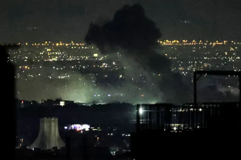 Smoke plumes billow from the site of airstrikes near Azadi Tower in western Tehran on March 10, 2026. The United States and Israel launched strikes against Iran on February 28, sparking swift retaliation by the Islamic republic which responded with missile attacks across the region. The war has dragged in global powers, upended the world's energy and transport sectors, and brought chaos to even usually peaceful areas of the volatile region. (Photo by ATTA KENARE/AFP)/Attention editors: AFP covers the war in the Middle East through its extensive regional network, including bureaus in Tehran, Jerusalem and several neighboring countries.Since the start of the conflict, journalists have been working under increasingly restrictive conditions. Authorities in several countries have limited reporters? movements, photo and live video coverage from sensitive locations. Some governments and armed groups have banned images of missile or drone strikes and other security-related sites./
