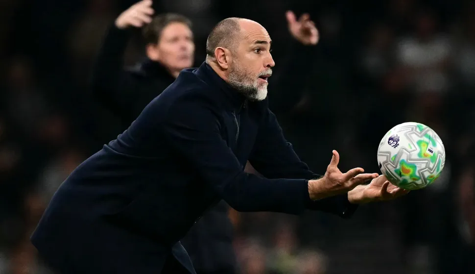 Tottenham Hotspur's Croatian head coach Igor Tudor throws the ball during the English Premier League football match between Tottenham Hotspur and Crystal Palace at the Tottenham Hotspur Stadium in London, on March 5, 2026. (Photo by Ben STANSALL/AFP)/RESTRICTED TO EDITORIAL USE. No use with unauthorized audio, video, data, fixture lists, club/league logos or 'live' services. Online in-match use limited to 120 images. An additional 40 images may be used in extra time. No video emulation. Social media in-match use limited to 120 images. An additional 40 images may be used in extra time. No use in betting publications, games or single club/league/player publications./