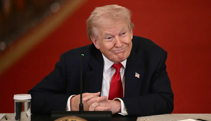US President Donald Trump listens during a roundtable to "save college sports" in the East Room of the White House in Washington, DC, on March 6, 2026. (Photo by Brendan SMIALOWSKI/AFP)