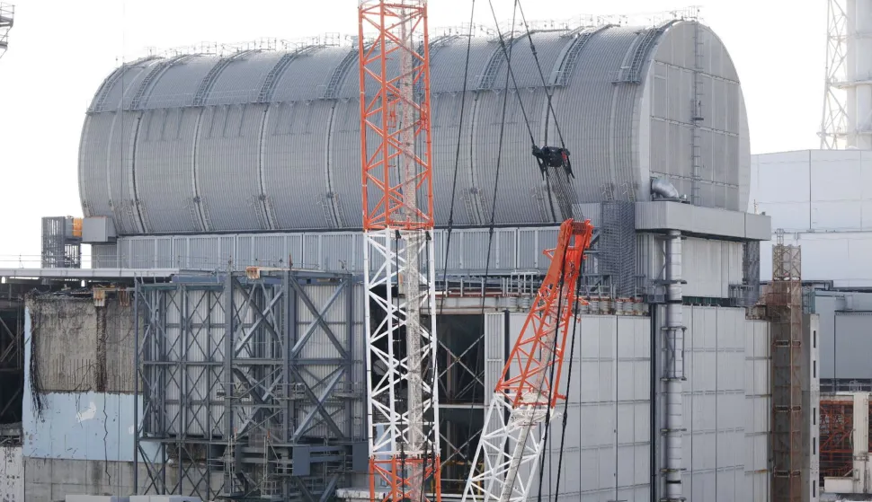 This photo taken on January 27, 2026 shows the exterior of the Fukushima Daiichi Nuclear Power Plant's Unit 3, seen in Okuma Town, Fukushima Prefecture. (Photo by JIJI PRESS/AFP)/Japan OUT