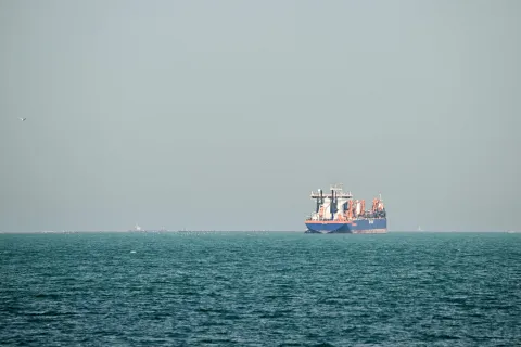 A commercial vessel is pictured offshore in Dubai on March 11, 2026. New attacks hit three commercial ships in the Gulf on March 11, with one of the vessels in flames as Iran pressed its campaign against its oil-exporting neighbours, threatening shipping in the Strait of Hormuz and plunging the global energy economy into crisis. (Photo by AFP)/Attention editors: AFP covers the war in the Middle East through its extensive regional network, including bureaus in Tehran, Jerusalem and several neighboring countries.Since the start of the conflict, journalists have been working under increasingly restrictive conditions. Authorities in several countries have limited reporters? movements, photo and live video coverage from sensitive locations. Some governments and armed groups have banned images of missile or drone strikes and other security-related sites./