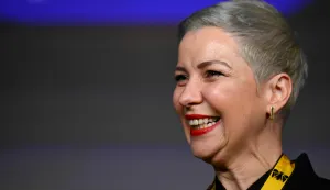 Belarusian street protest leader Maria Kolesnikova reacts after having been awarded with the 2022 International Charlemagne Prize of Aachen (Karlspreis) during a ceremony at the Coronation Hall of the Town Hall in Aachen, western Germany on March 14, 2026. Kolesnikova was belatedly awarded with the 2022 International Charlemagne Prize of Aachen due to her political imprisonment in Belarus. She was released on December 13, 2025 along with 122 other prisoners after more than five years in prison for opposing Belarus's President Lukashenko. (Photo by INA FASSBENDER/AFP)