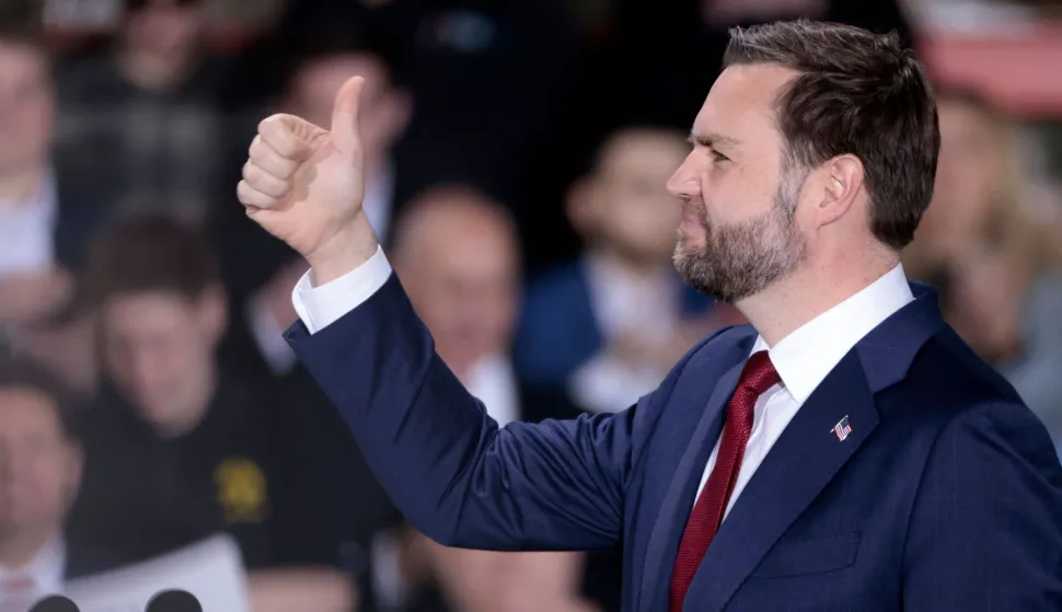 US Vice President JD Vance gives a thumb's up as he speaks during a visit to the Engineering Design Services Inc. manufacturing facility in Auburn Hills, Michigan on March 18, 2026. (Photo by JEFF KOWALSKY/AFP)