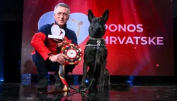 17.03.2026., Zagreb - Svecana dodjela nagrade Ponos Hrvatske u Tvornici kulture. Hrvoje Domazetovic, pas LunaNizozemska ovčarka Luna, potražni pas HGSS - Stanica Osijek