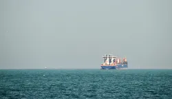 A commercial vessel is pictured offshore in Dubai on March 11, 2026. New attacks hit three commercial ships in the Gulf on March 11, with one of the vessels in flames as Iran pressed its campaign against its oil-exporting neighbours, threatening shipping in the Strait of Hormuz and plunging the global energy economy into crisis. (Photo by AFP)/Attention editors: AFP covers the war in the Middle East through its extensive regional network, including bureaus in Tehran, Jerusalem and several neighboring countries.Since the start of the conflict, journalists have been working under increasingly restrictive conditions. Authorities in several countries have limited reporters? movements, photo and live video coverage from sensitive locations. Some governments and armed groups have banned images of missile or drone strikes and other security-related sites./