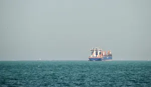 A commercial vessel is pictured offshore in Dubai on March 11, 2026. New attacks hit three commercial ships in the Gulf on March 11, with one of the vessels in flames as Iran pressed its campaign against its oil-exporting neighbours, threatening shipping in the Strait of Hormuz and plunging the global energy economy into crisis. (Photo by AFP)/Attention editors: AFP covers the war in the Middle East through its extensive regional network, including bureaus in Tehran, Jerusalem and several neighboring countries.Since the start of the conflict, journalists have been working under increasingly restrictive conditions. Authorities in several countries have limited reporters? movements, photo and live video coverage from sensitive locations. Some governments and armed groups have banned images of missile or drone strikes and other security-related sites./