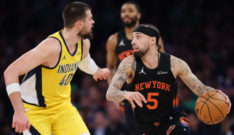 NEW YORK, NEW YORK - MARCH 17: Guard Jose Alvarado #5 of the New York Knicks dribbles against center Ivica Zubac #40 of the Indiana Pacers during the second half at Madison Square Garden on March 17, 2026 in New York City. The Knicks won 136-110. NOTE TO USER: User expressly acknowledges and agrees that, by downloading and or using this photograph, User is consenting to the terms and conditions of the Getty Images License Agreement. Sarah Stier/Getty Images/AFP (Photo by Sarah Stier/GETTY IMAGES NORTH AMERICA/Getty Images via AFP)